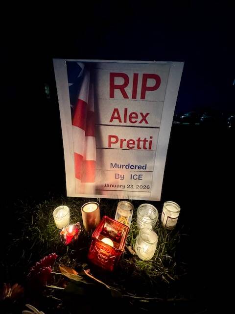 Contributed photo by Ronda Bishop
A sign and candles in honor of Alex Pretti.