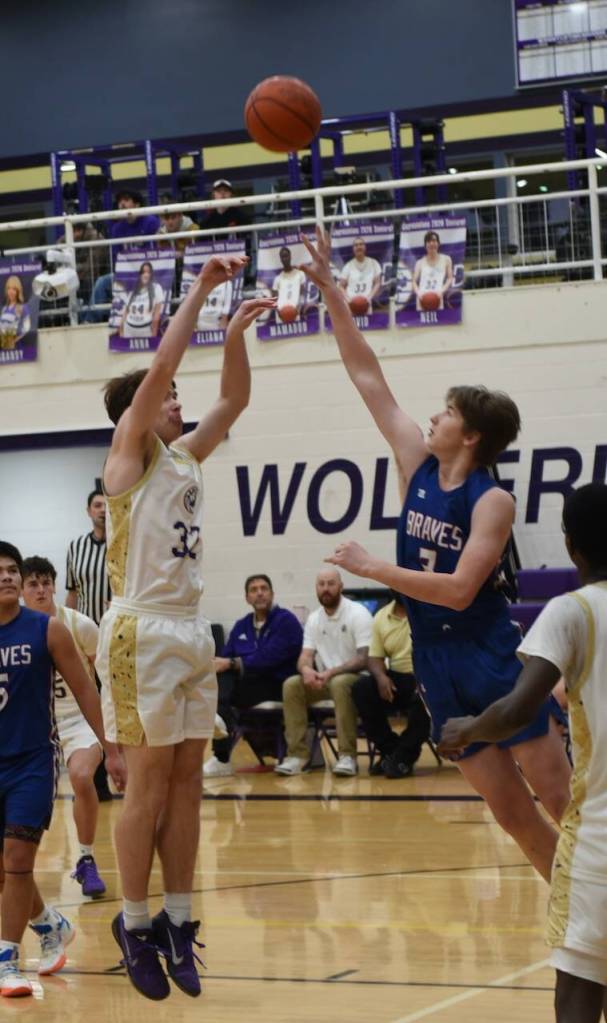 Contributed photo by John Stimpson 
Neil Gresseth, #32, with a 5 foot jump shot for two points.