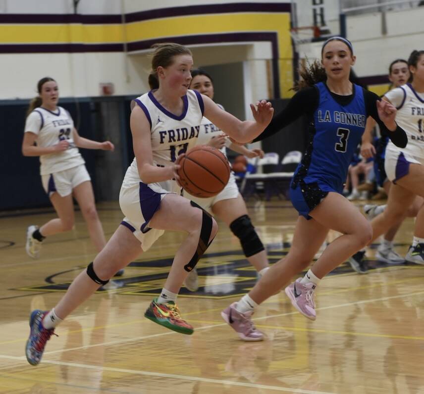 Contributed photo by John Stimpson 
Harper Feliz, #12,  on a fast break to the basket..jpeg