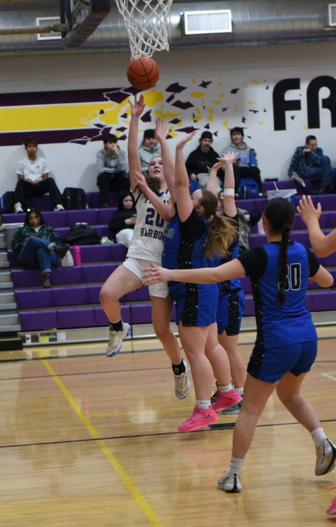 Contributed photo by John Stimpson 
 Ila Allen, #20, shoots a four foot jumper.