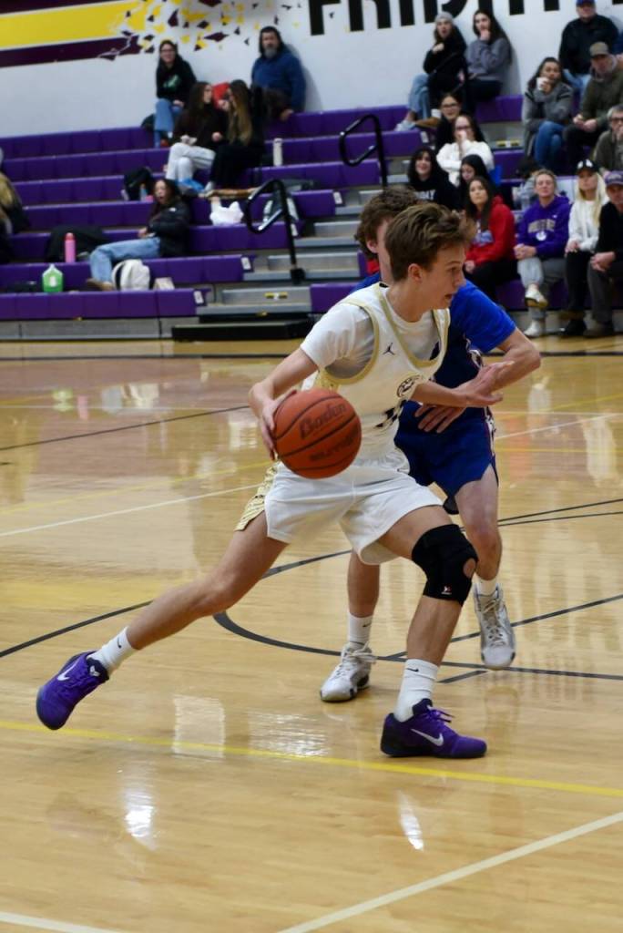 Contributed photo by John Stimpson 
Kaden Horn, #11,  cuts inside for a drive tothe basket.