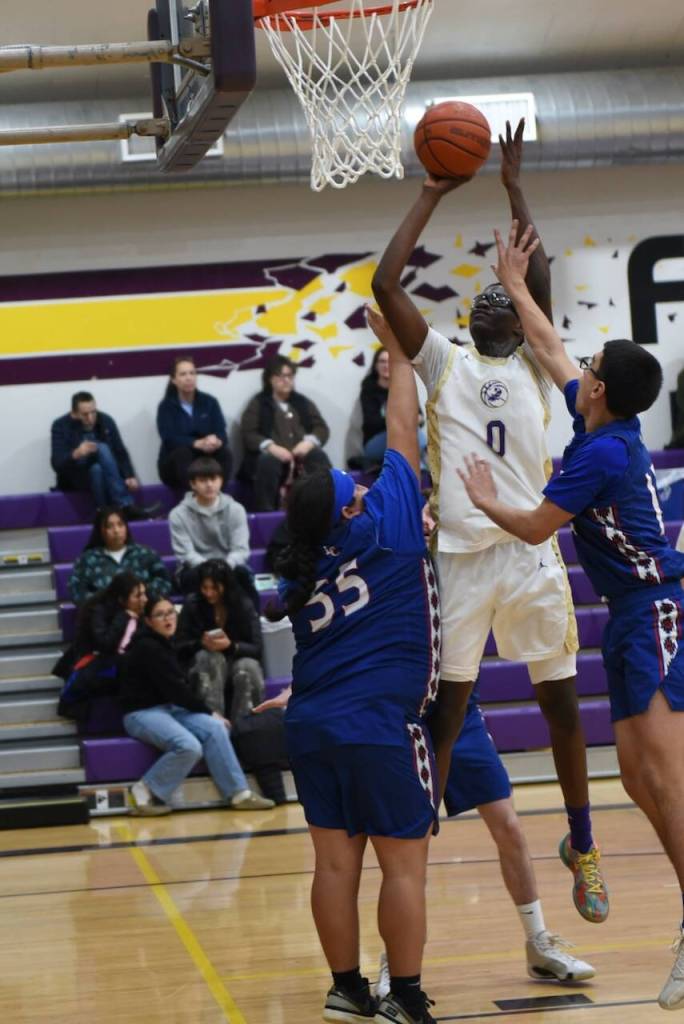 Contributed photo by John Stimpson 
Mamadoo Hoskins,  #0, easily drops in a two pointer.