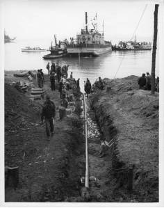 Contributed photo
In 1951, Bonneville Power Administration engineers completed the installation of a 7.5-mile, 25,000-volt submarine power cable connecting Anacortes to Decatur Island, which was the worlds longest underwater power line at that time. Approximately 500 spectators gathered along the shoreline, and boats paused their travel to observe the final five miles of high-voltage cable being laid across the bottom of Rosario Strait. Photo courtesy of Bonneville Power Administration.