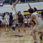 Contributed photo by John Stimpson
Phenix Thomas, #3, with a jumpshot to the basket and two points.