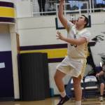 Contributed photo by John Stimpson
David Markham, #33, races to the rim for two points.