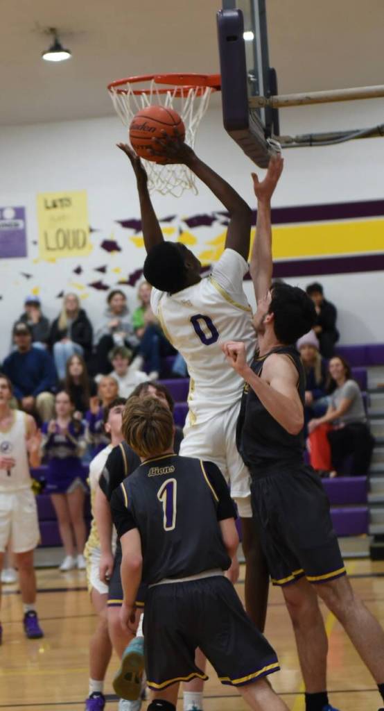 Contributed photo by John Stimpson
Mamadoo Hoskins, #0, reaches to score 2 points.