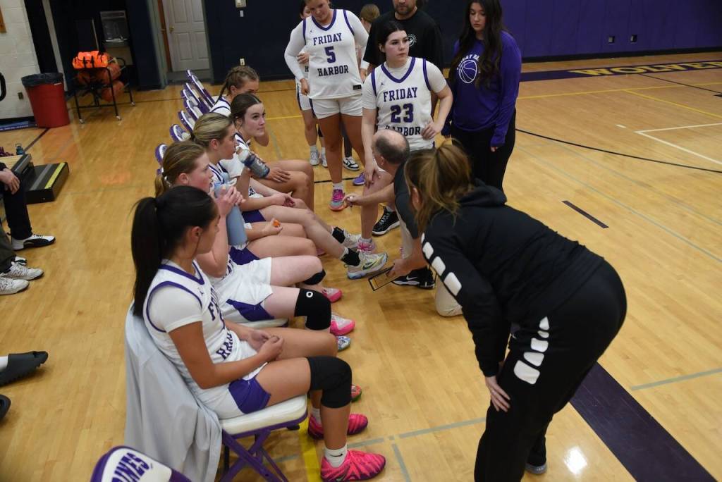 Contributed photo by John Stimpson
Coach Mandy and Coach Rod talk strategy.