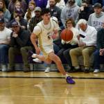 Contributed photo by John Stimpson
Channing Kleine, #5, brings the ball upcourt to start the play.