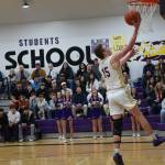 Contributed photo by John Stimpson
Ben Baisch, #15, lays up for two points.