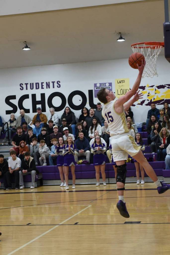 Contributed photo by John Stimpson
Ben Baisch, #15, lays up for two points.