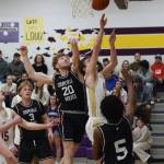 Contributed photo by John Stimpson
Duncan Bogart, #1, with strong defensive pressure scores two points underneath.