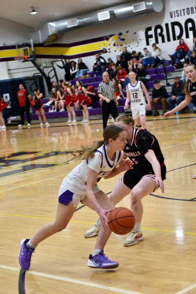 Contributed photo by John Stimpson
Lyla Ovenell, #4, on the way to the hoop.