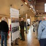 Contributed photo.
Islanders take a peek at what a new library could look like.