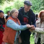 Darrell Kirk photo. Gathering of community in Olga for Gathering of the Eagles canoe voyage in 2025.