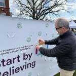 Contributed photo
A community member signing the pledge at last years event.