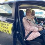 Contributed photo.
Council member Kari McVeigh making a Meals on Wheels delivery.