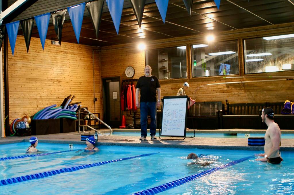 Contributed photo
US Master Swimmers listen to Coach Kent Slyter