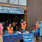 OPALCO photo.
OPALCO Member Service Team representatives welcome members into the event. From left to right: Member Services Supervisor Katherine Santos Santana, Member Services Representatives Tacy Nichols and Madeline Danielson.